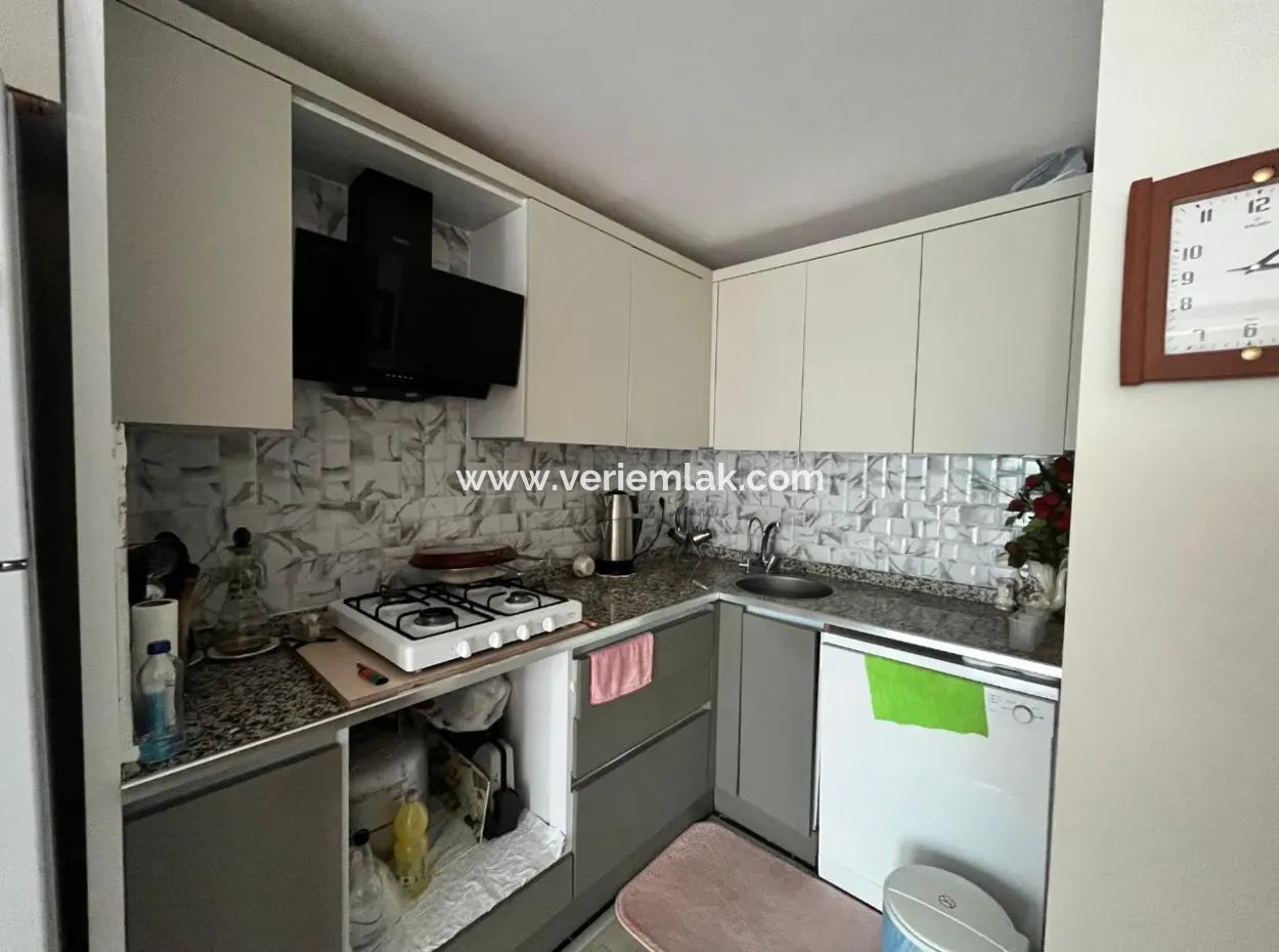 Unmissable Opportunity In Seferihisar Pazaryeri: 2 1 Apartment For Sale With Terrace And Balcony