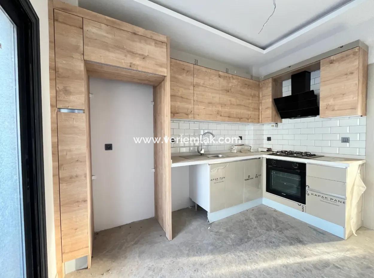 2 1 Brand New Apartment In Seferihisar With Separate Kitchen, Balcony And 3 Built-In Sets!