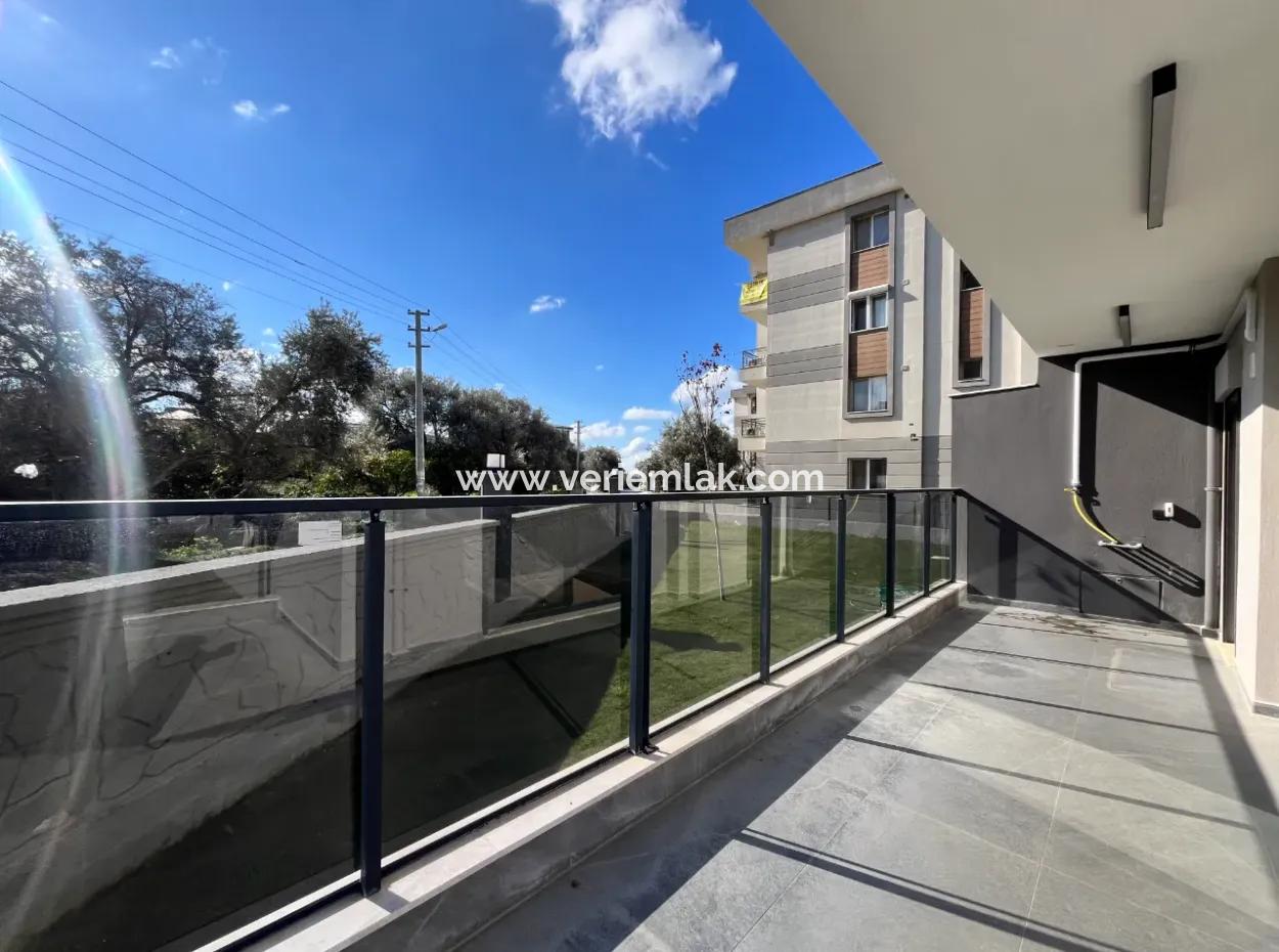 2 1 Brand New Apartment With Separate Kitchen In A Complex With Garden, Pool And Security In Seferihisar Camikebir Neighborhood