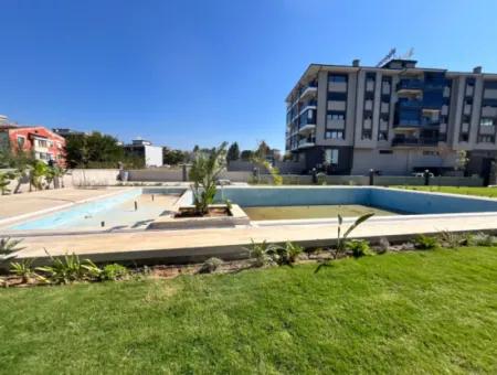 Brand New 3 1 Apartment In A Complex With Pool In Seferihisar | 140 M² | En-Suite Bathroom | Separate Kitchen | Terrace With View | Large Landscaping Areas | Spacious Living