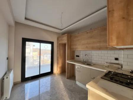 2 1 Brand New Apartment In Seferihisar With Separate Kitchen, Balcony And 3 Built-In Sets!