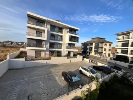 2 1 Brand New Apartment In Seferihisar With Separate Kitchen, Balcony And 3 Built-In Sets!