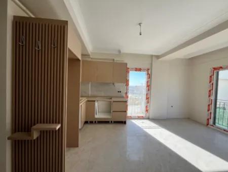 1 1 Apartment 1 Km From Izmir-Kusadasi Road, Modern And Illuminated By Sunlight! Underfloor Heating, Elevator And Automatic Shutter Feature