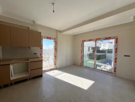 1 1 Apartment 1 Km From Izmir-Kusadasi Road, Modern And Illuminated By Sunlight! Underfloor Heating, Elevator And Automatic Shutter Feature