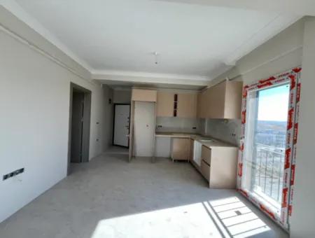 1 1 Apartment 1 Km From Izmir-Kusadasi Road, Modern And Illuminated By Sunlight! Underfloor Heating, Elevator And Automatic Shutter Feature