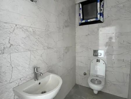 Investment Opportunity In Gözsüzler: Modern Apartment For Sale With Corner Location And Terrace